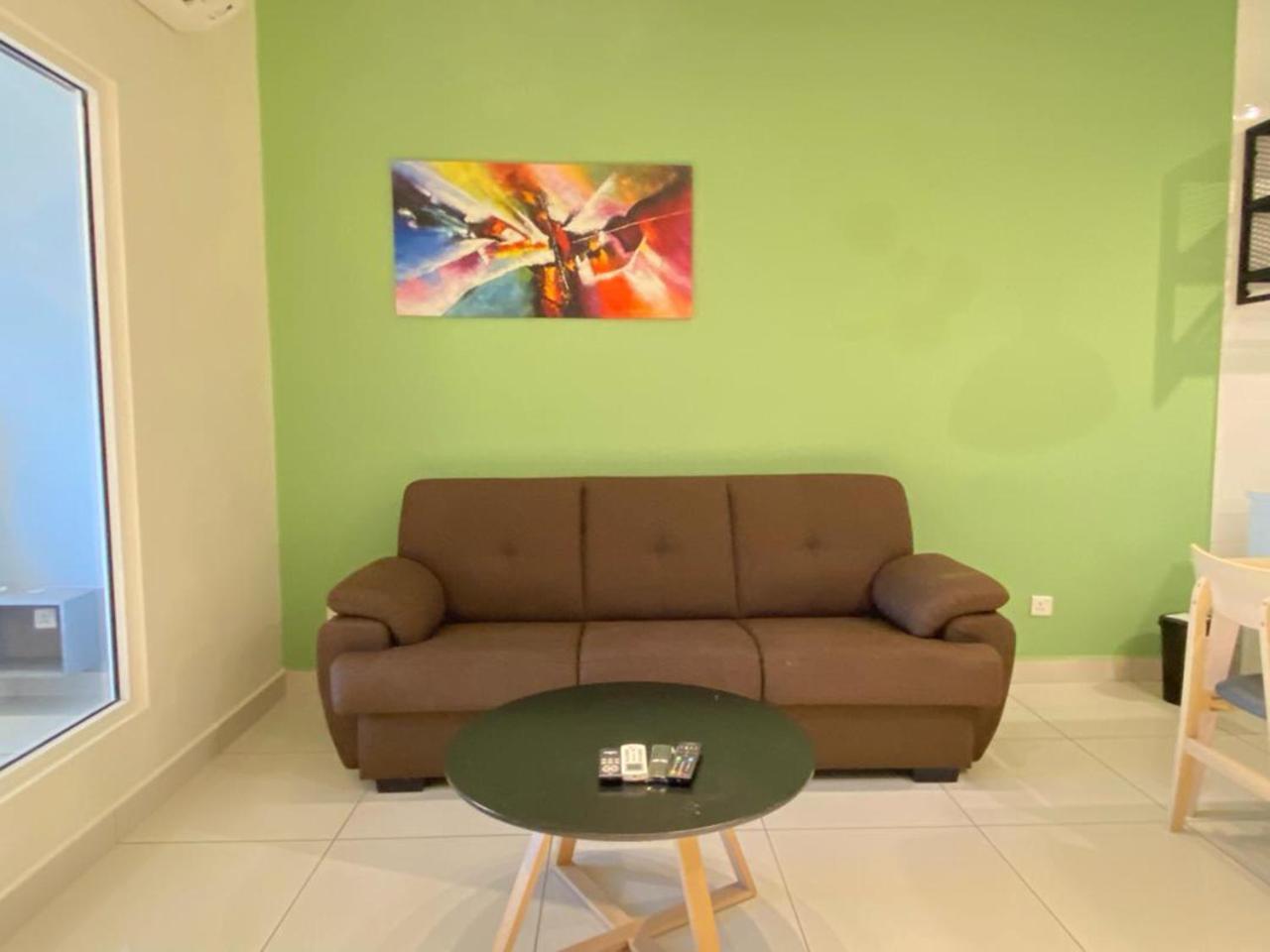 Aparthotel Arte Mont Kiara à Kuala Lumpur Extérieur photo A living room with a sofa